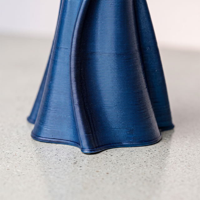 close up of blue vase bottom and base