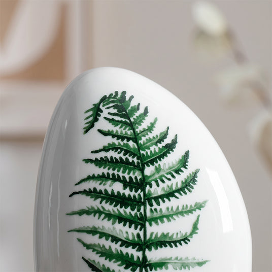 close up of fern leaf print on ceramic