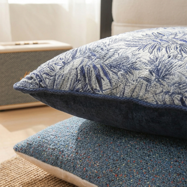 close up of jacquard pillow edge and piping detail