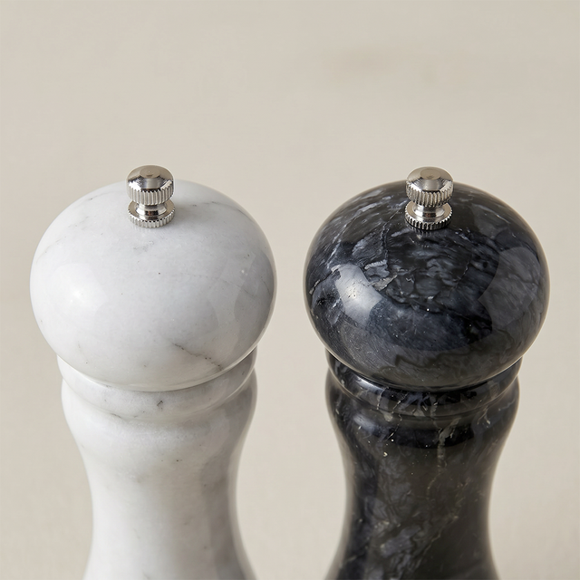 close up of marble mills top silver knobs