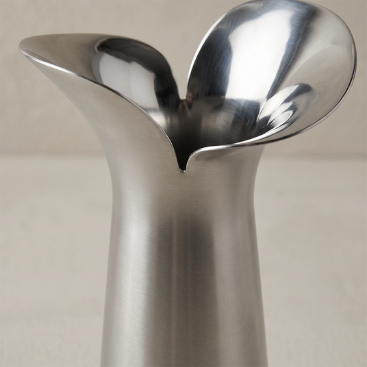 close up of silver petal vase top opening