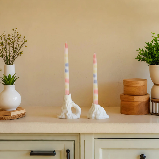 colorful dripping scented candle on the cabinet