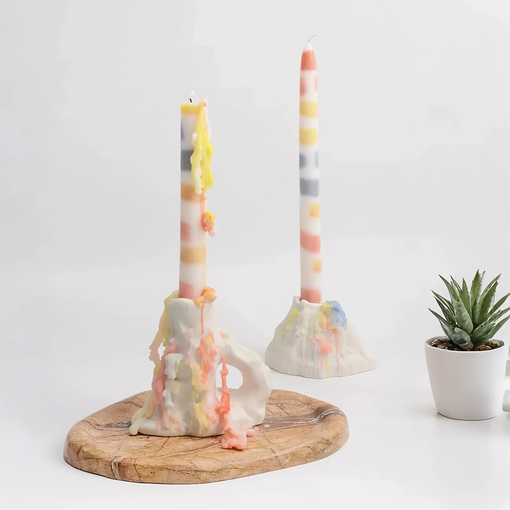 colorful dripping scented candle on the table