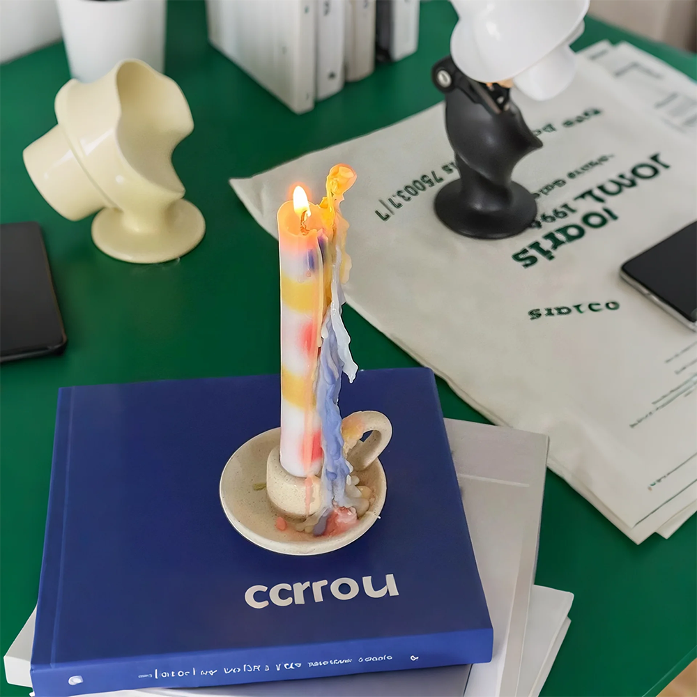 colorful dripping scented candle on the table