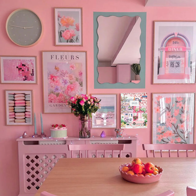 colorful travel calender 2025 on the pink wall