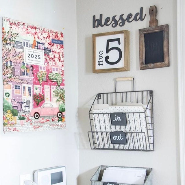 colorful travel calender 2025 on the wall