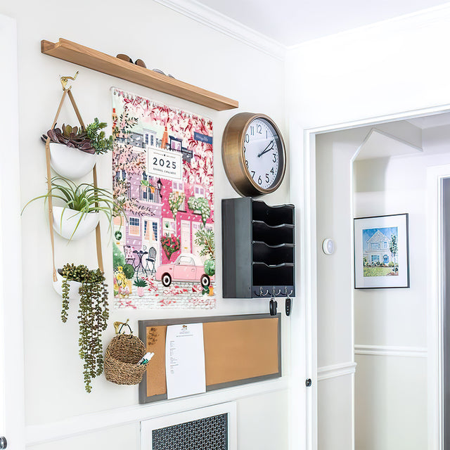 colorful travel calender 2025 on the wall