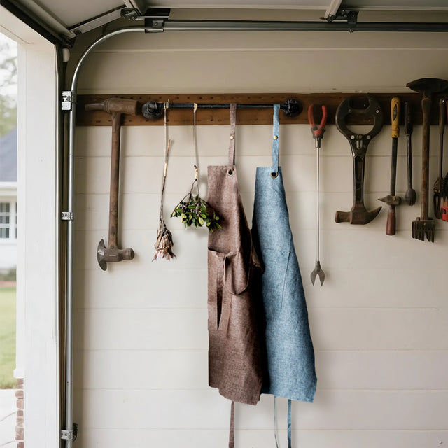cotton linen waterproof apron on the wall together with the tools