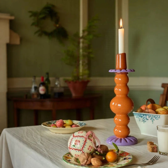 creative art glass candle holder on dining table