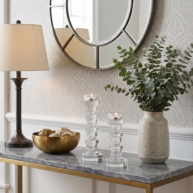 crystal candle holders on marble console with mirror