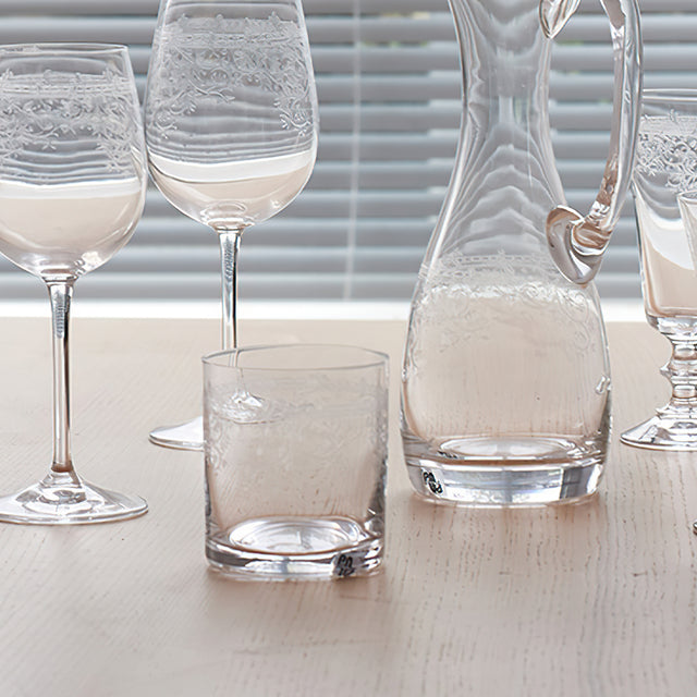 crystal whiskey glass with carved flowers details