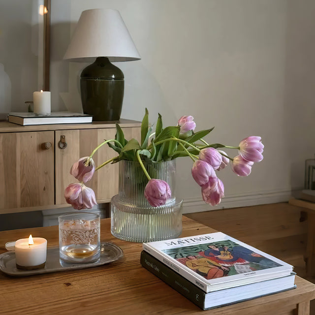 crystal whiskey glass with carved flowers on the table