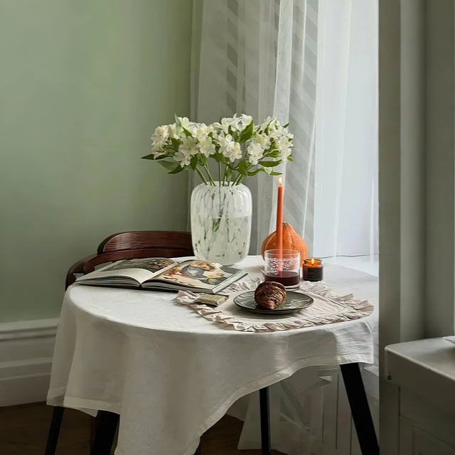 crystal whiskey glass with carved flowers on the table