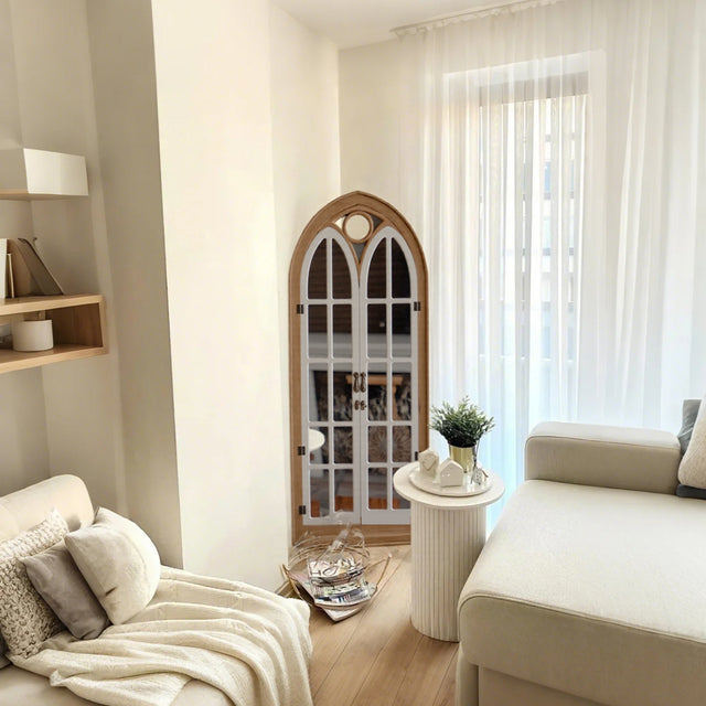 decorative mirror standing against the wall