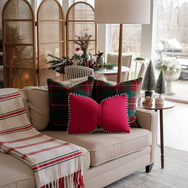 decorative red bow throw pillow in the living room