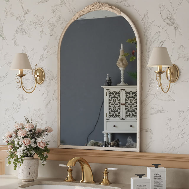 dressing mirror above the sink