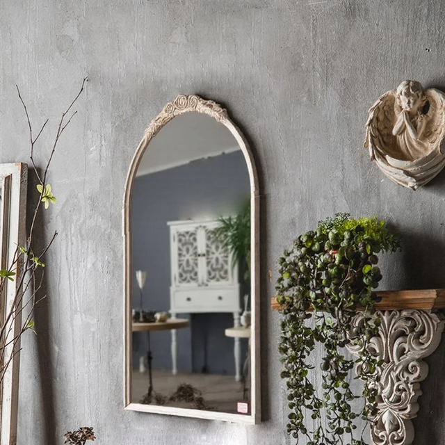 dressing mirror hanging on the wall