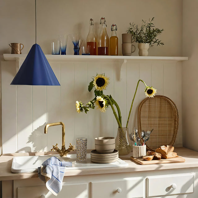 elegant crystal gold rimmed tall glass cups in the kitchen