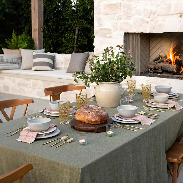 elegant gold rimmed drinking glasses placed with bowls