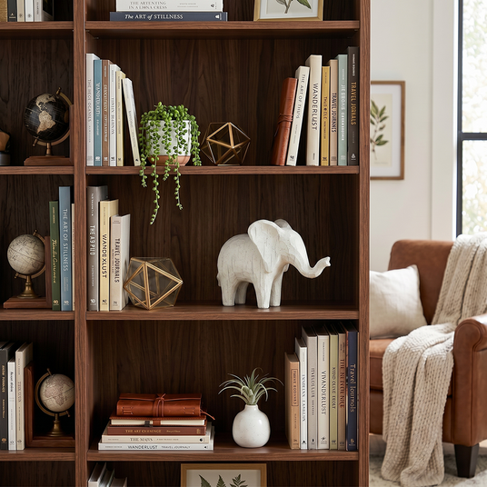 elephant sculpture on white shelf
