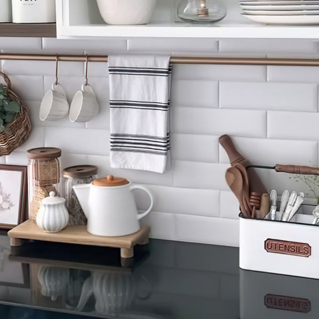 embossed ceramic teapot with bamboo wood lid in the kitchen