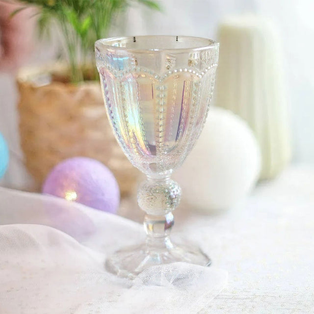 embossed glass iridescent water goblet on the table