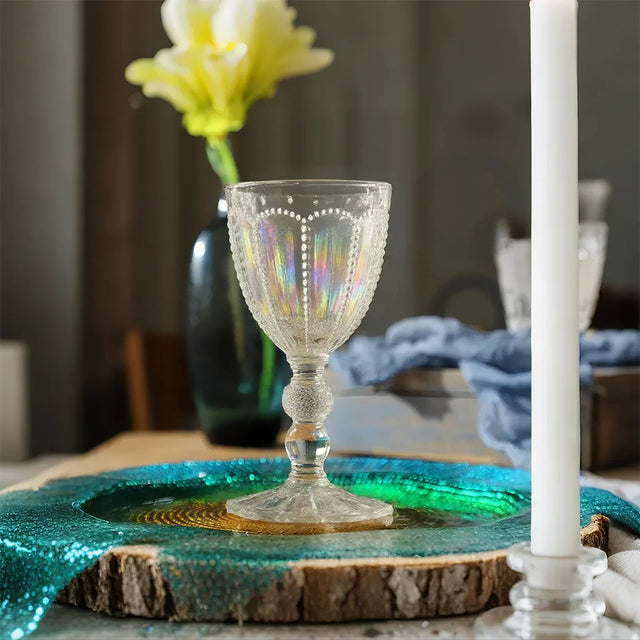 embossed glass iridescent water goblet on the table
