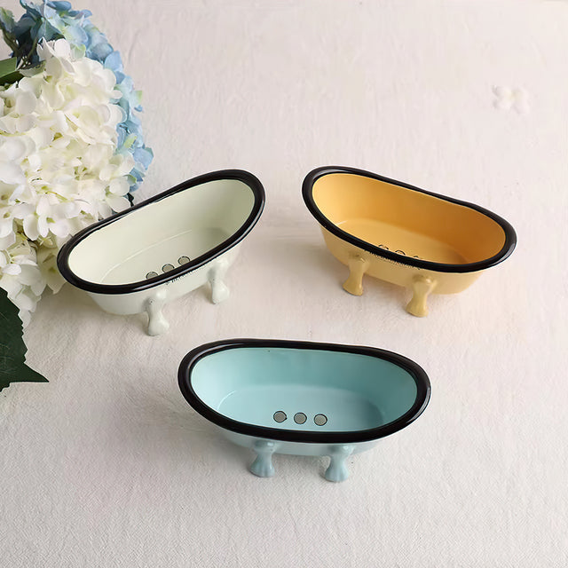 enamel-bathtub-shaped-soap-dish-with-drainage-holes-close-up-07112