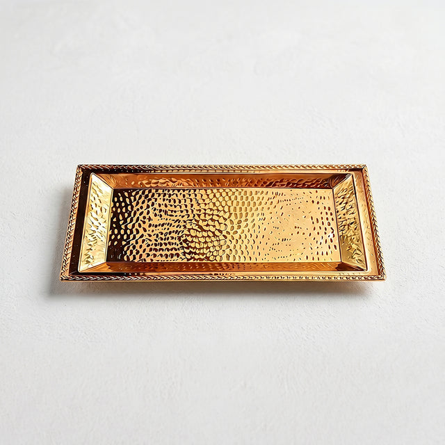 engraved gold tray on white