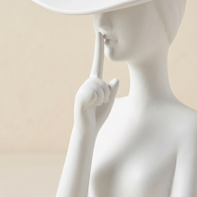 figure vase hand gesture close up