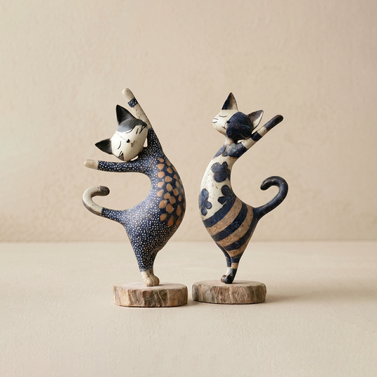figurines two blue standing cats white background