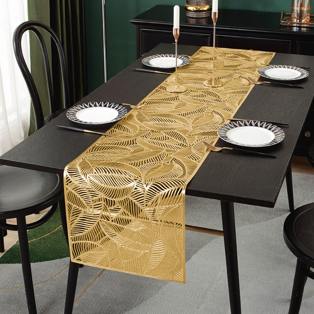 floral lace PVC table runner placed on the dining table