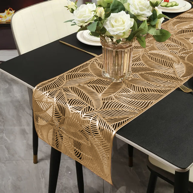 floral lace PVC table runner placed on the dining table