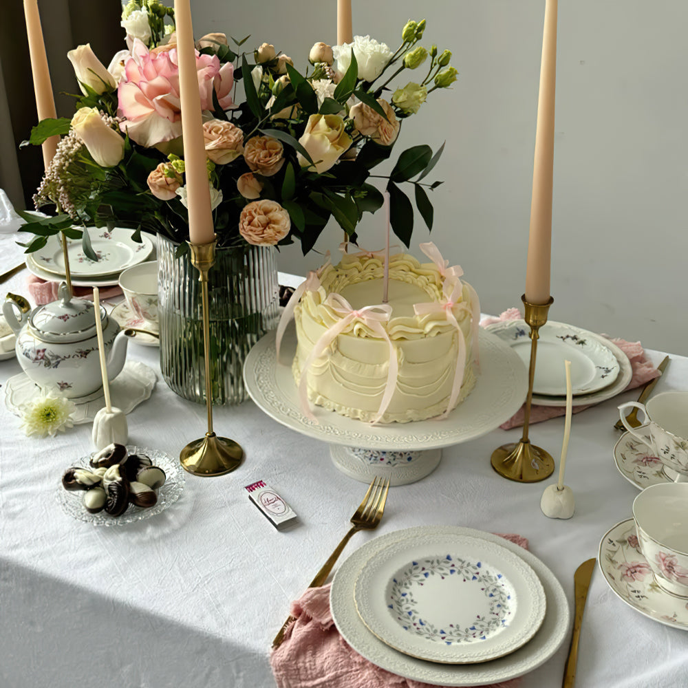 floral vine embossed ceramic serving cake stand with cake