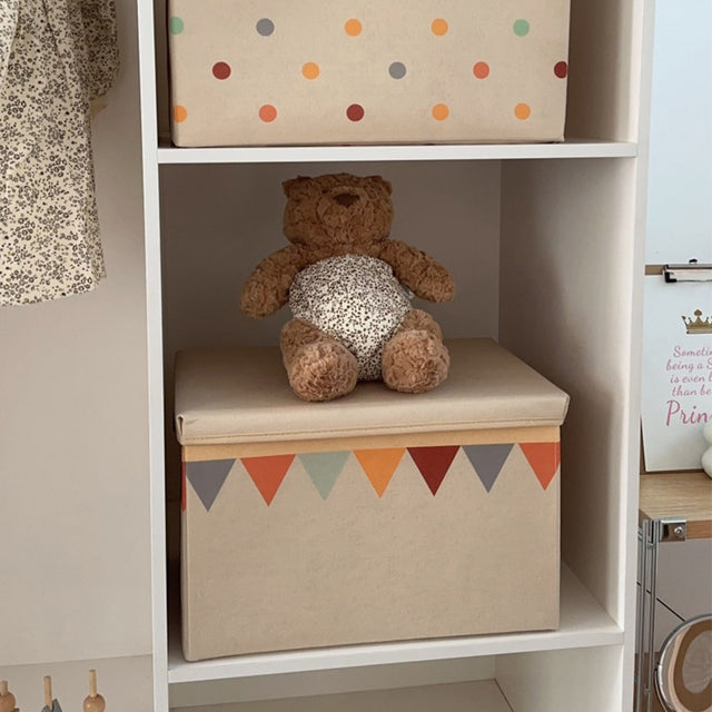 foldable colorful storage box with a lid in the cupboard