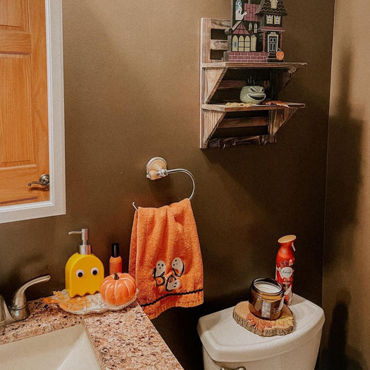 ghost shaped ceramic press-type dispenser bottle in the bathroom