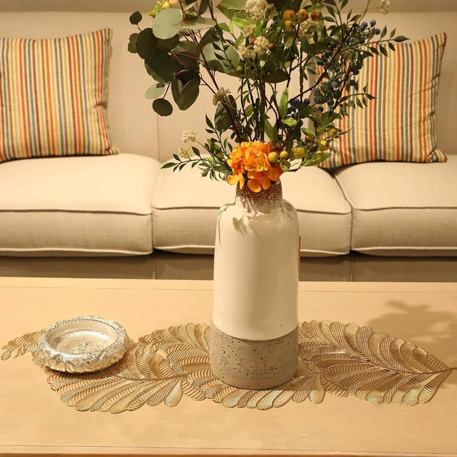 gold foil leaf cutout PVC placemat on dining table