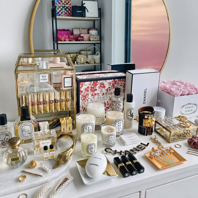 gold square resin tray with cosmetics