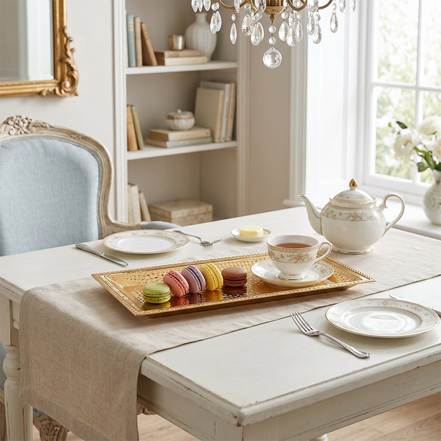 gold tray with cups on desk