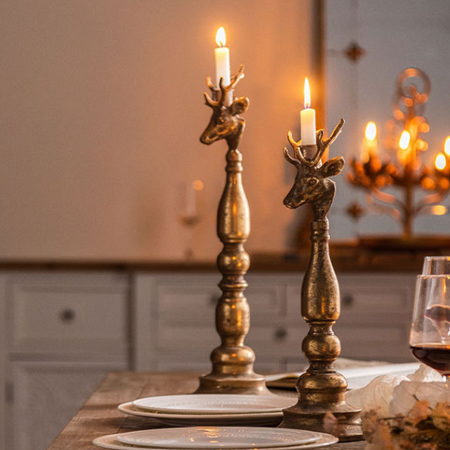 golden candle holder on the dining table