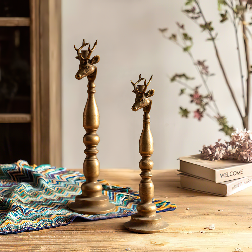 golden candle holder on the table