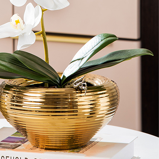 golden-ceramic-vase-close-up-06172