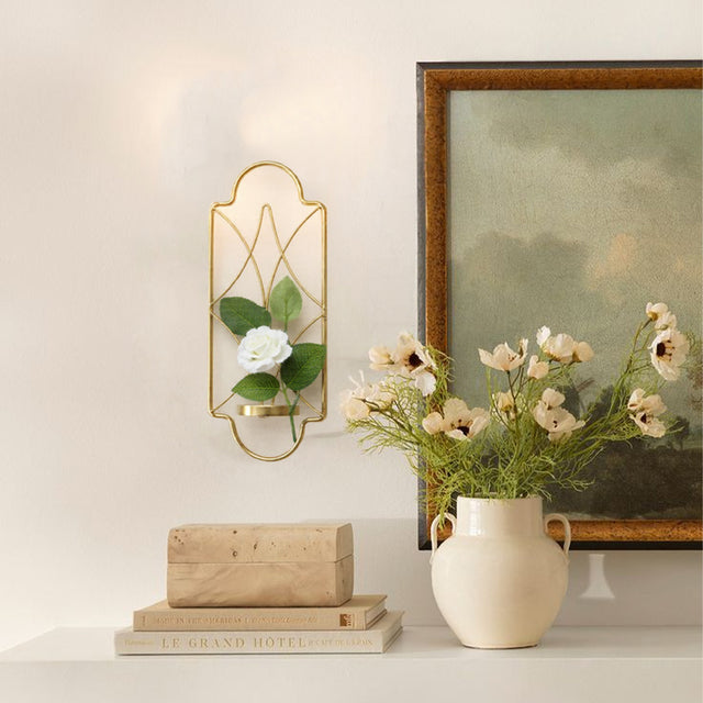 golden multifunctional iron wall hanging shelf beside the mural