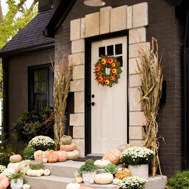 golden pumpkin harvest wreath hang on white door