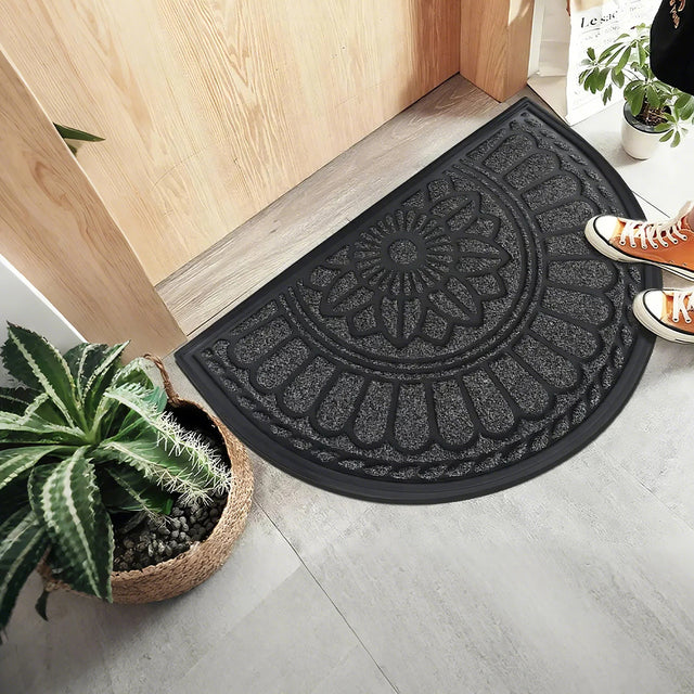 gray semi-circle rubber doormat as entry decor