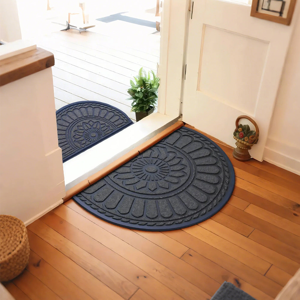 gray semi-circle rubber doormat at the entrance