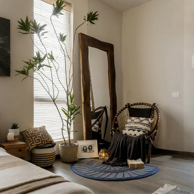 gray semi-circle rubber doormat near the mirror