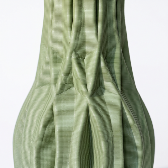green vase ribbed texture detail