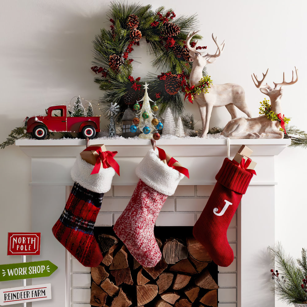 hand blown glass christmas tree as christmas on fireplace