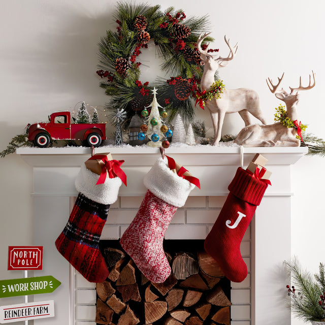 hand blown glass christmas tree as christmas on fireplace